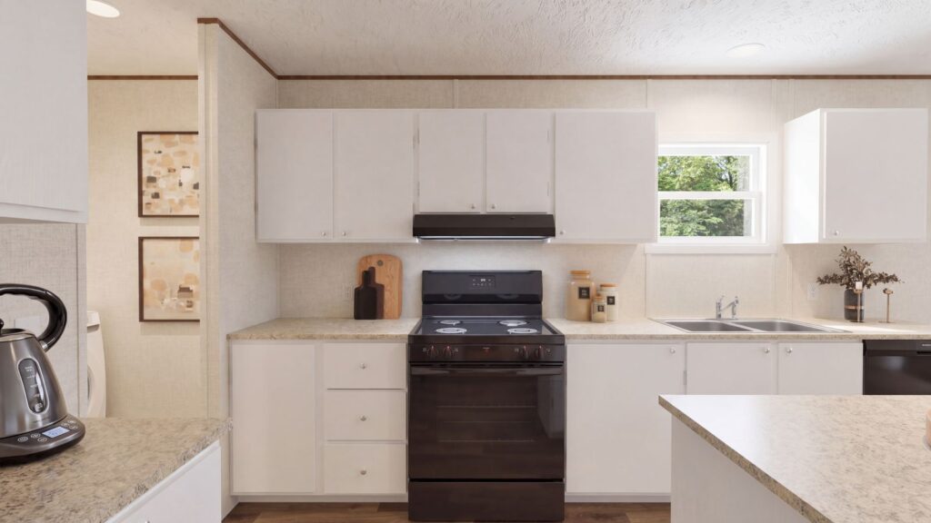 The SPRUCE Kitchen. This Manufactured Mobile Home features 3 bedrooms and 2 baths.