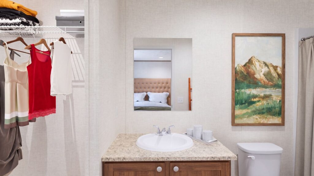The DOGWOOD Primary Bathroom. This Manufactured Mobile Home features 2 bedrooms and 2 baths.