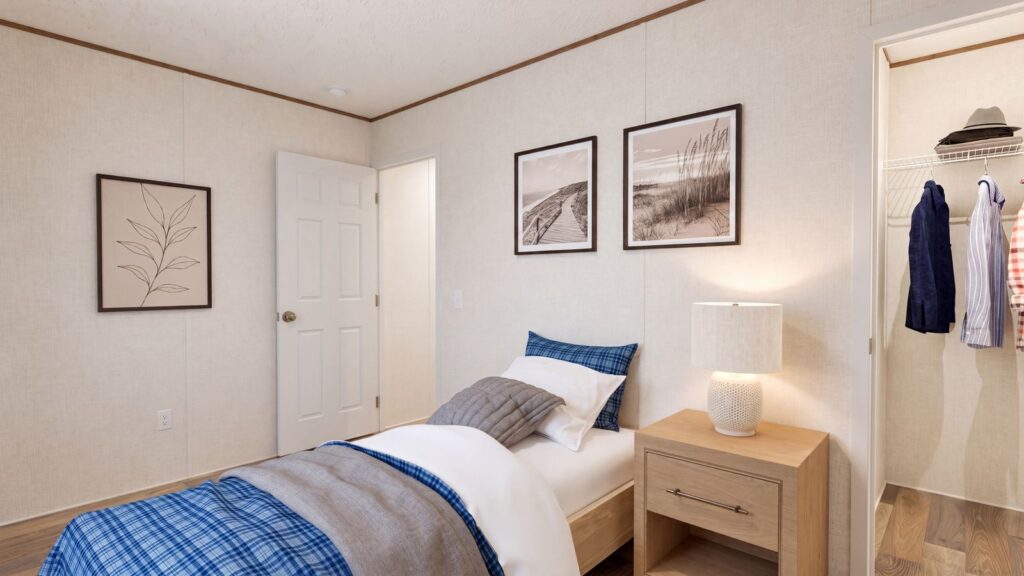 The DOGWOOD Guest Bedroom. This Manufactured Mobile Home features 2 bedrooms and 2 baths.