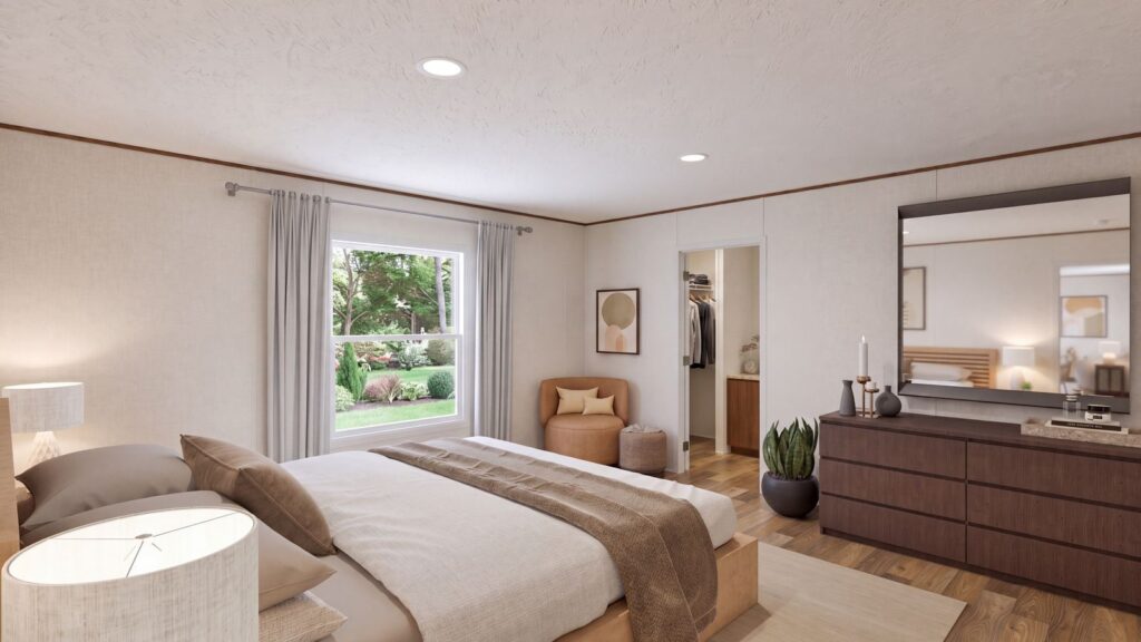 The MAGNOLIA Primary Bedroom. This Manufactured Mobile Home features 3 bedrooms and 2 baths.