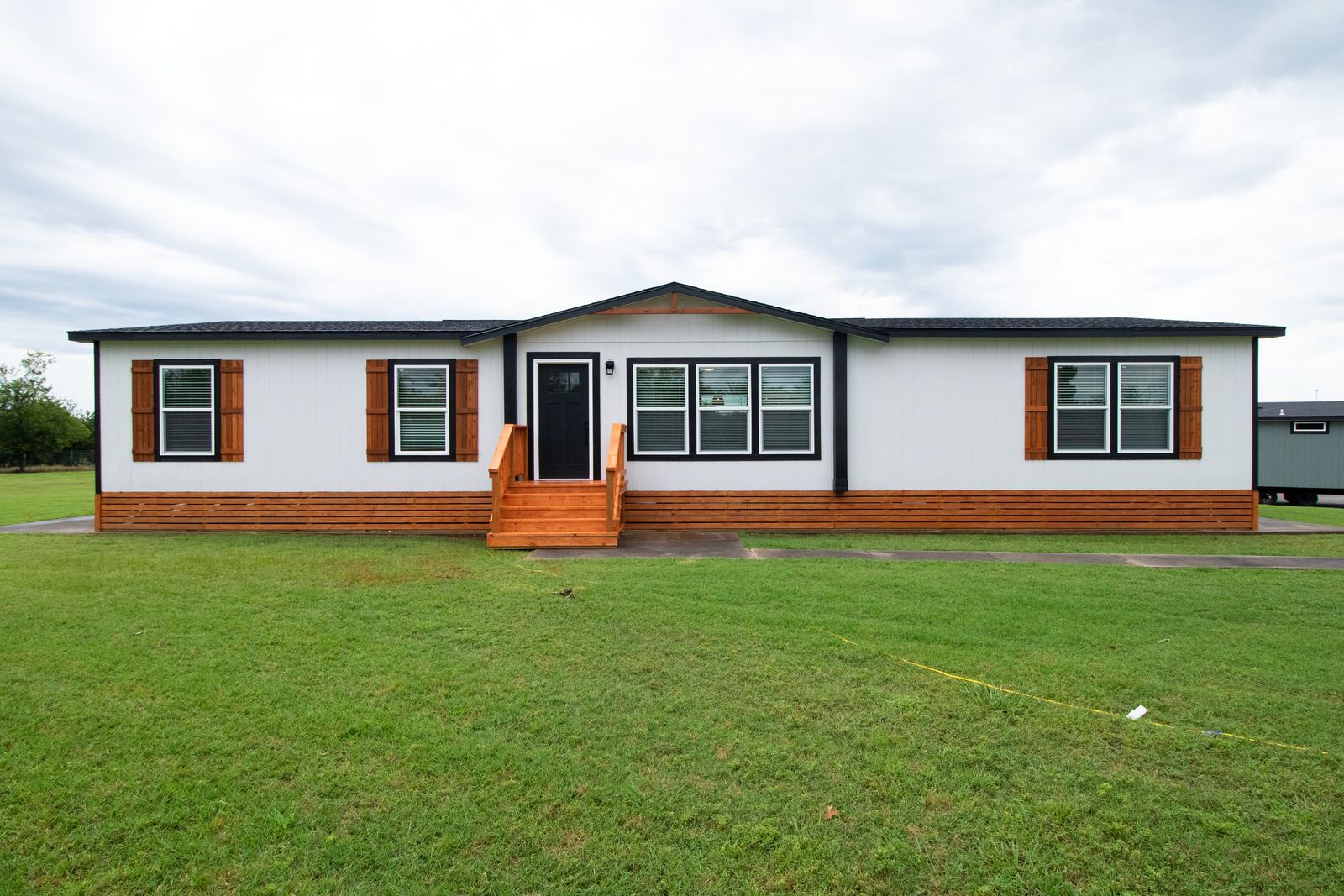 Exterior view 1 of the Clayton Odyssey 4 bedroom double wide manufactured home at Granger Mobile Homes