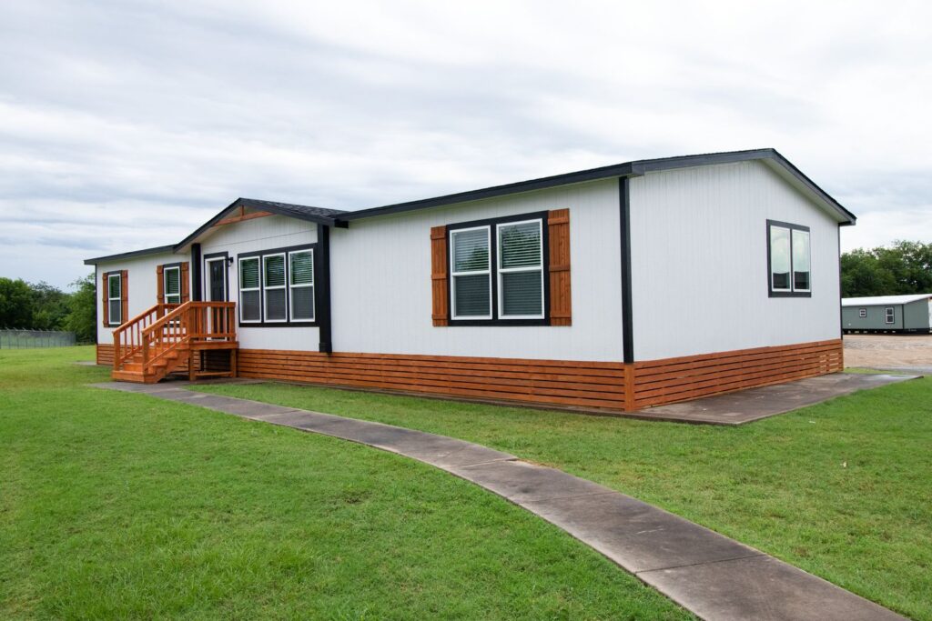 Exterior view 2 of the Clayton Odyssey 4 bedroom double wide manufactured home at Granger Mobile Homes