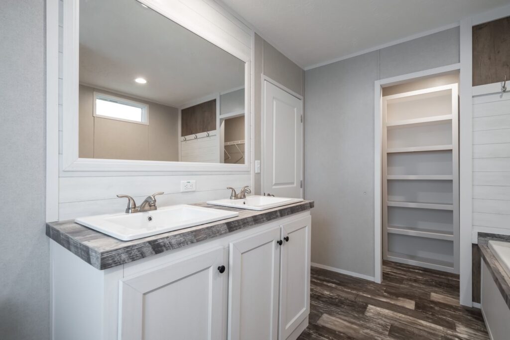 The Willow by Clayton: Primary bathroom double vanity and walk-in closet